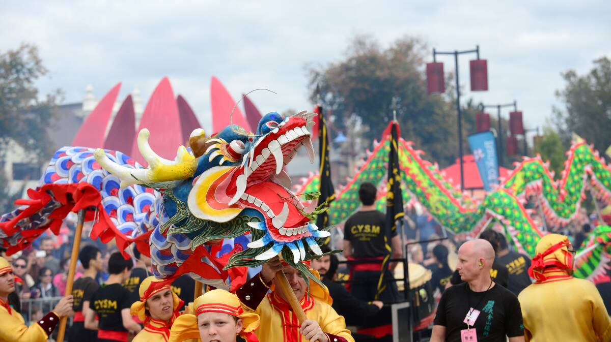 Dragons, Lions and Chinese dancers exit the Golden Dragon Museum on their way to View st before the parade.

Picture: JIM ALDERSEY