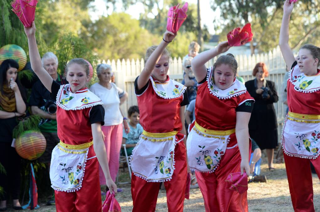 Bendigo Chinese Association Plum Blossom dancers perform. 