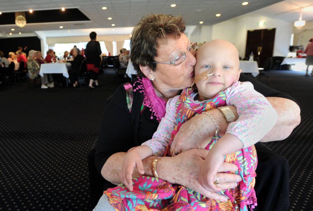 LOVE: Abigail Pickrill, 4, is hugged by her grandma Norma Donnan. Picture: JODIE DONNELLAN.