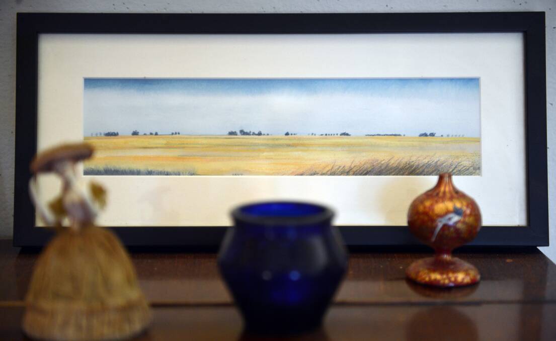 Robyn Ballinger's partner Tom Henty's watercolour of the northern plains of Victoria. Picture: BRENDAN McCARTHY