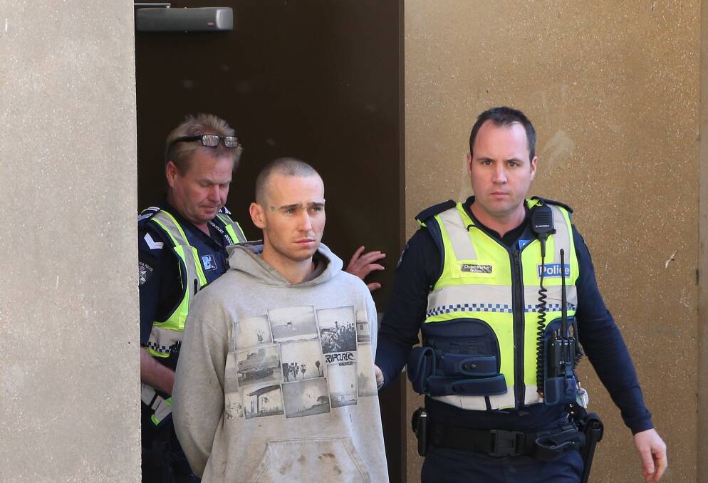 Matthew Drew leaves the Bendigo Magistrates' Court in custody earlier this month.