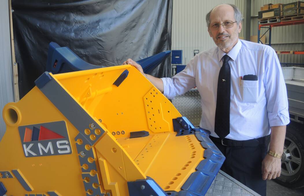 Keech chief executive officer Herbert Hermens with a prototype construction 'bucket', a design he needed to send to Indonesia on a USB stick by mail due to slow internet speeds. Picture: ADAM HOLMES