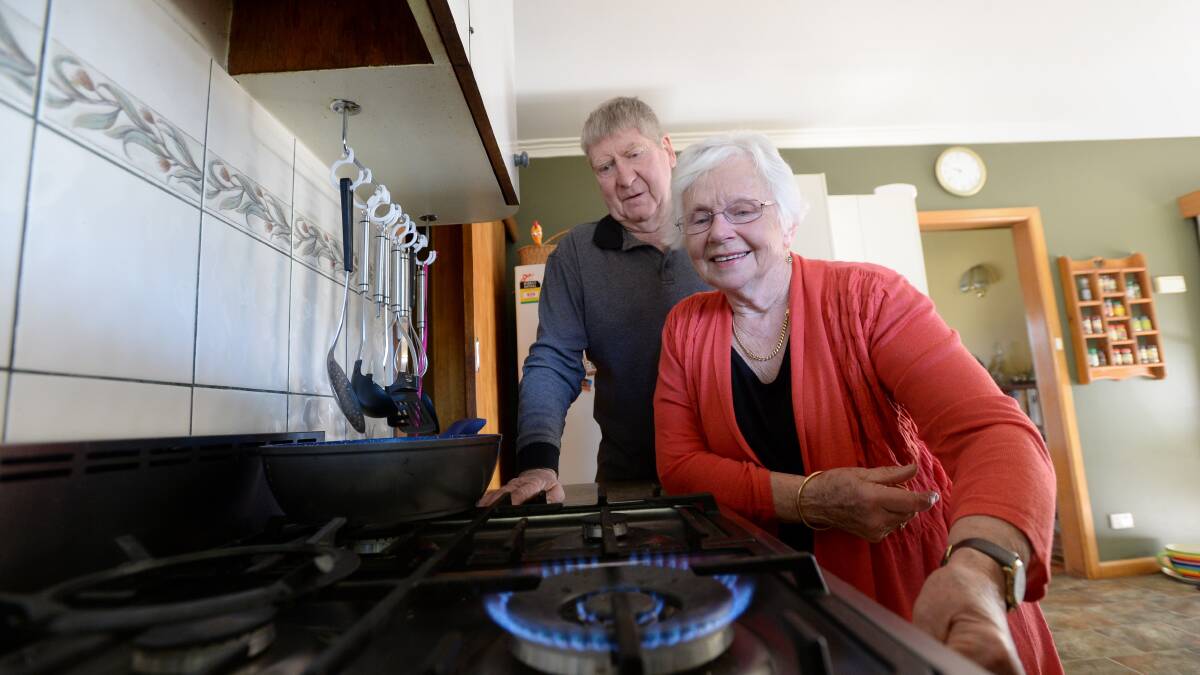 COOKING WITH GAS: Jan and Dale Johnson fire up their gas cook top in Huntly. Picture: JIM ALDERSEY