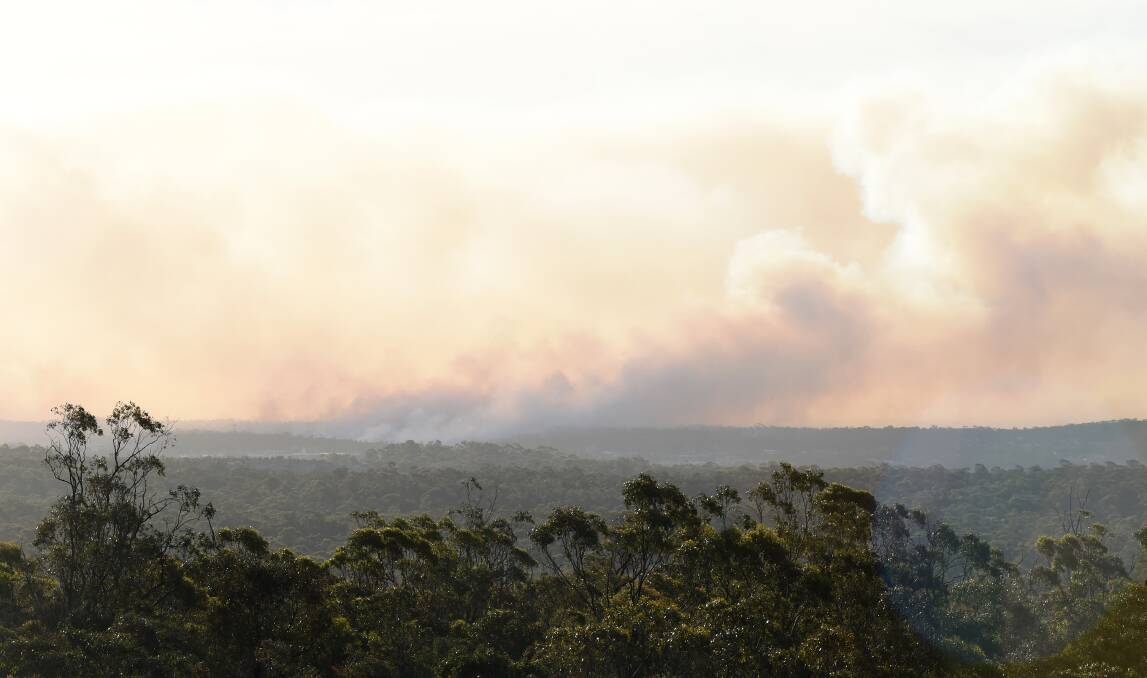SEASON APPROACHING: A controlled burn at Kangaroo Flat on Monday, seen from the One Tree Hill Lookout. Picture: JODIE DONNELLAN