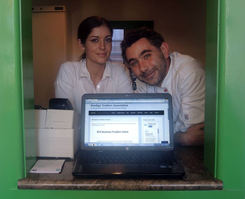 HERE TO HELP: Emily Pappas, BTA president Antony Adolf and the Business Problem Solver, availalbe on the BTA website.