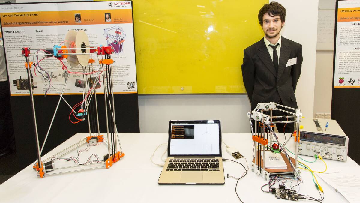 CREATE: Engineering student Keith Brown with a self-designed 3D printer.