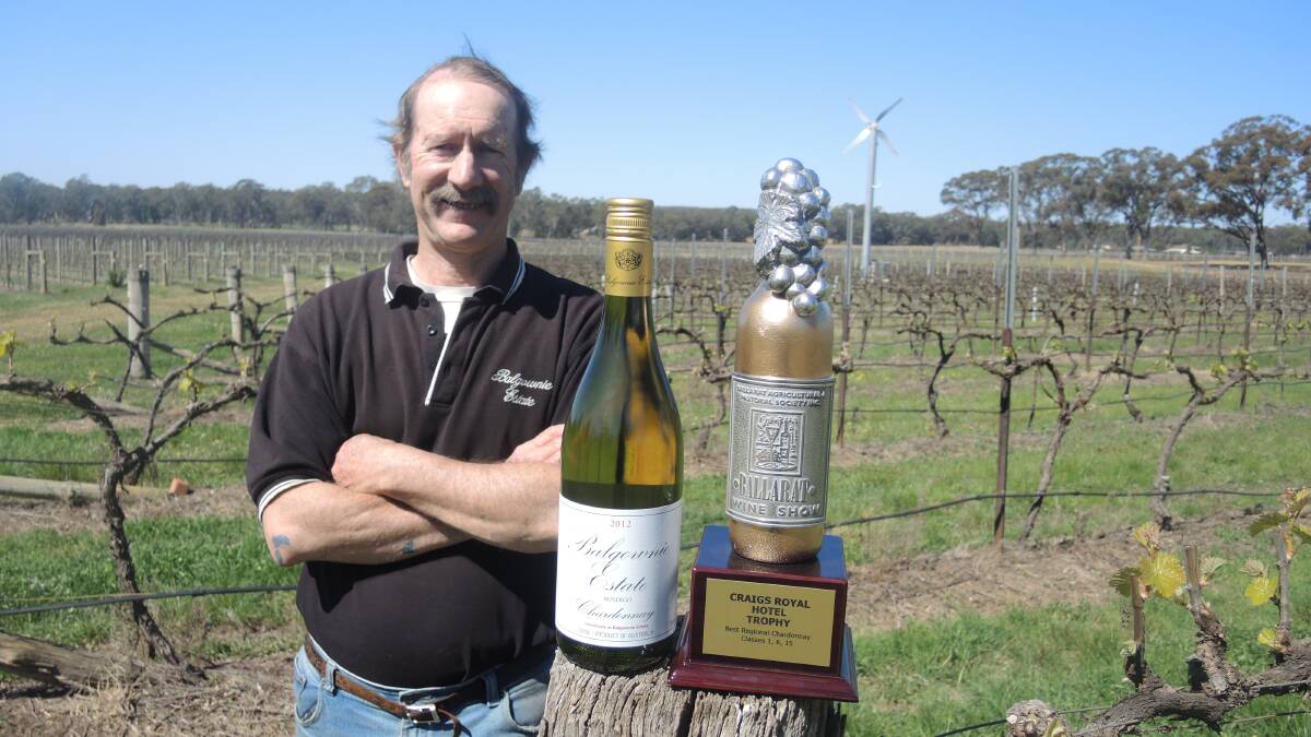 TOP DROP: Balgownie Estate winemaker Tony Winspear with their 2012 chardonnay, a trophy winner at the Ballarat Wine Show. Picture: ADAM HOLMES