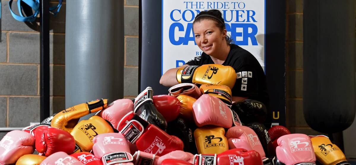 FINISH LINE: Lisa Nicolson has plenty of gloves for keen record-breaking locals. Picture: JODIE DONNELLAN