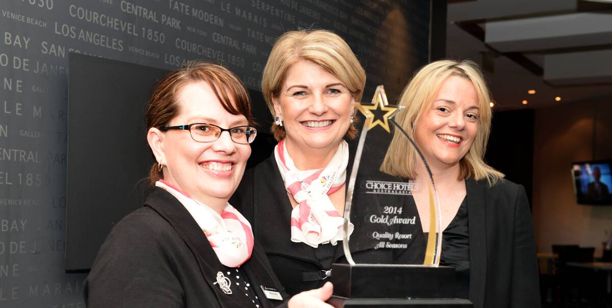 GOLD STAR: Michele Collins, Jeanine Cooke and Juleia Nilson display the gold award. Picture: LIZ FLEMING