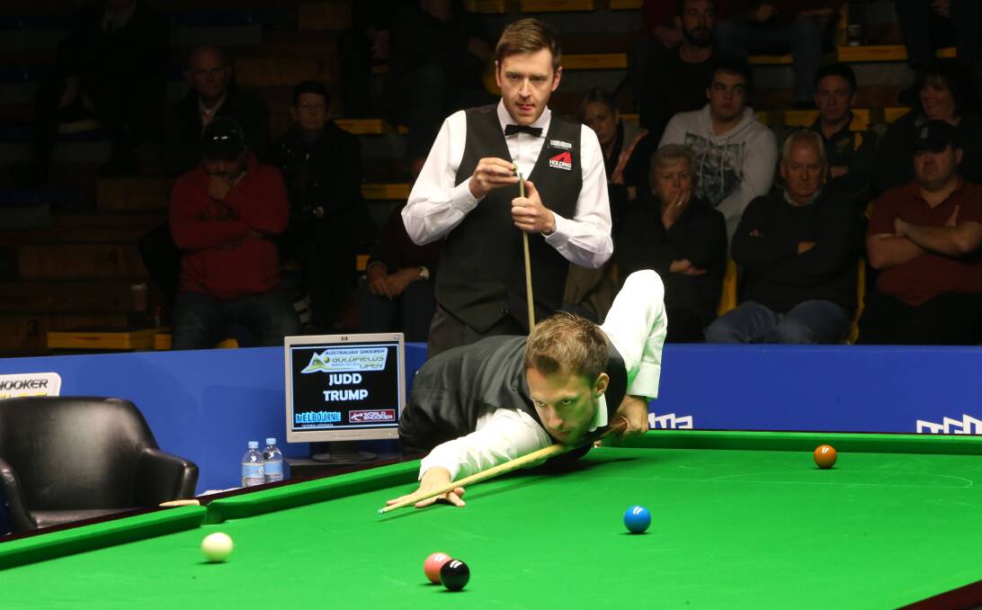 GREAT BATTLE: Judd Trump aims for the pocket as Ricky Walden looks on in their quarter-final clash at the $500,000 Australian Snooker Goldfields Open in Bendigo. Picture: PETER WEAVING 