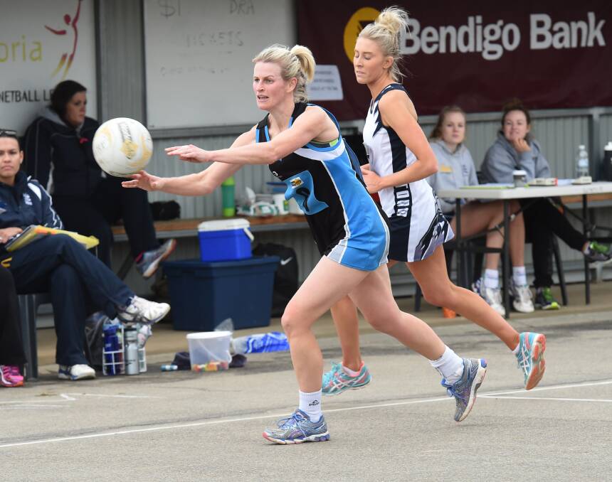 FINE GAME: Maryborough centre Alicia Cassidy passes the ball in Saturday's win on Strathfieldsaye's court. Picture: JODIE DONNELLAN