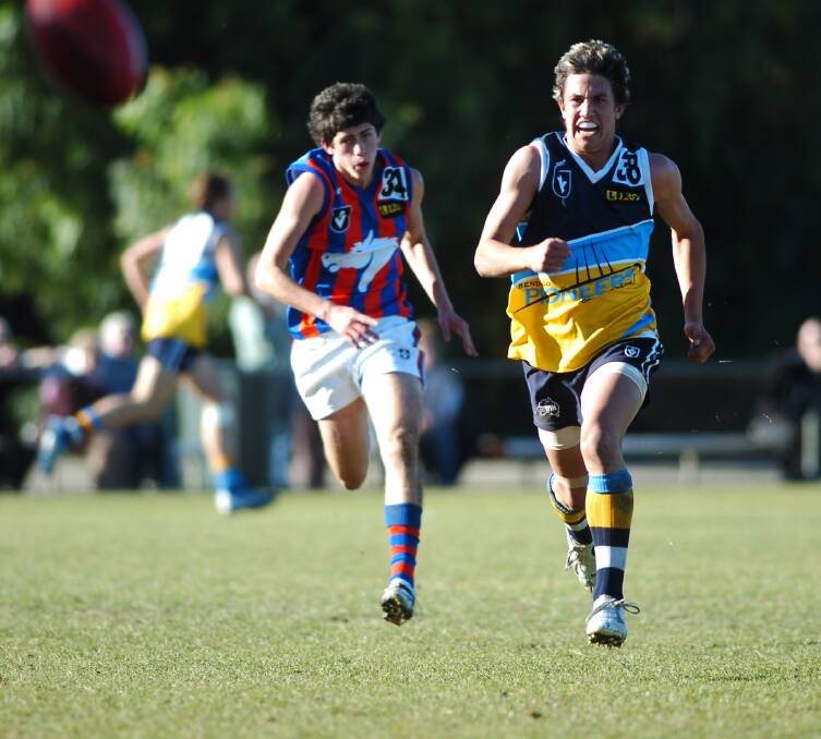 Grant Ford chases the bouncing ball in a 2006 clash. 