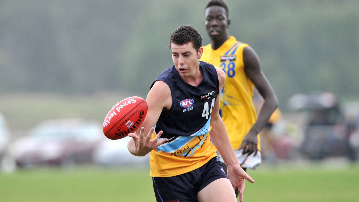Eaglehawk's Jack Lawton juggles the footy in the Bendigo Pioneers clash with Western Jets. Picture: JODIE DONNELLAN