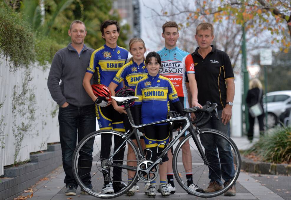READY TO ROLL: Paul Hadden from Hadden Farren Land Surveyors, cyclists Jagan Woods, Olivia Sens, Darien McDowell, Sam Crome, and Peter Sens from Precision Formworking. Picture: BRENDAN McCARTHY 