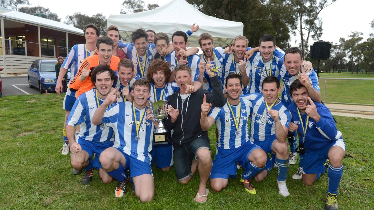 NUMBER ONE: Strathdale's division one team celebrates after winning last year's Knockout Cup final. 