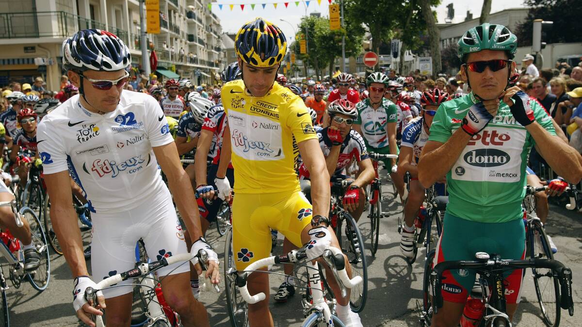 SUPERSTARS: Baden Cooke, Bradley McGee and Robbie McEwen before the start of stage three in the 2003 Tour de France. Picture: GETTY 