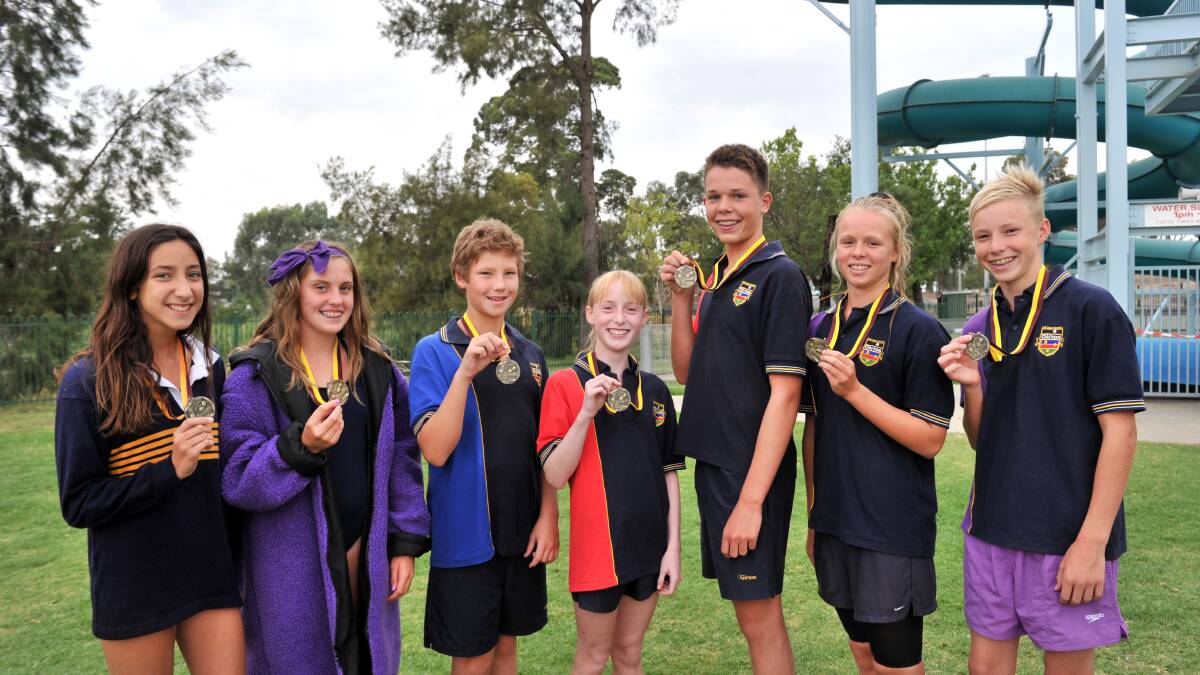Age group champions Cassandra Liacos, Abby Rowley and Sebastian Wood (13-years); Kate Hadkins and Cal Moloney (14-years); Millie Beaton and Bailey Edwards (15-years). 