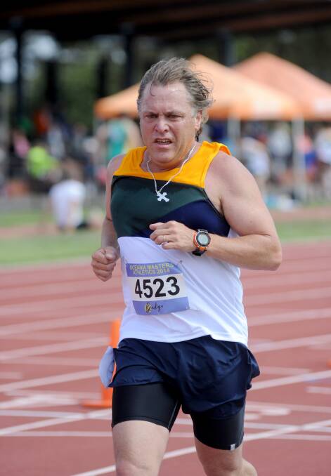 ANOTHER LAP: Neil Le Nepveu contests the 45-49 years 5000m.