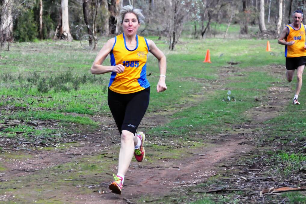 Ingrid Douglass in the early stages of the 6400m run at Woodvale. Picture: Jake Hilson. 
