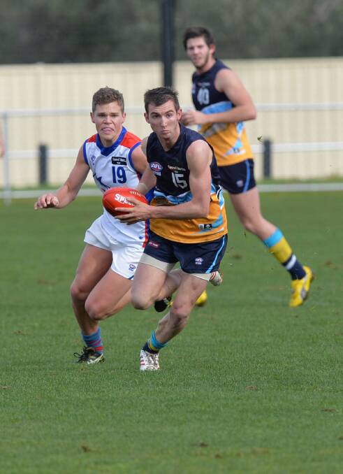 ATTACK: Jed Brain charges from defence in the Bendigo Pioneers clash with  Oakleigh at Epsom-Huntly Reserve. Picture: BRENDAN McCARTHY