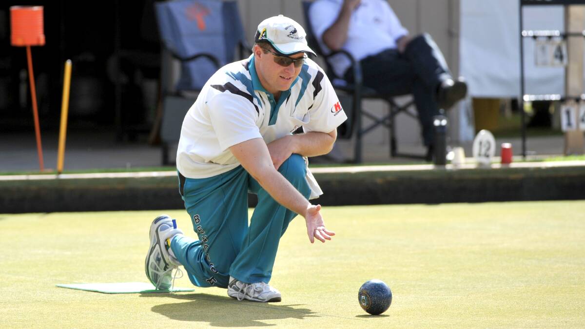 HOME GREENS: Bendigo East's Brad Holland bowls in the men's singles. Picture: JODIE DONNELLAN