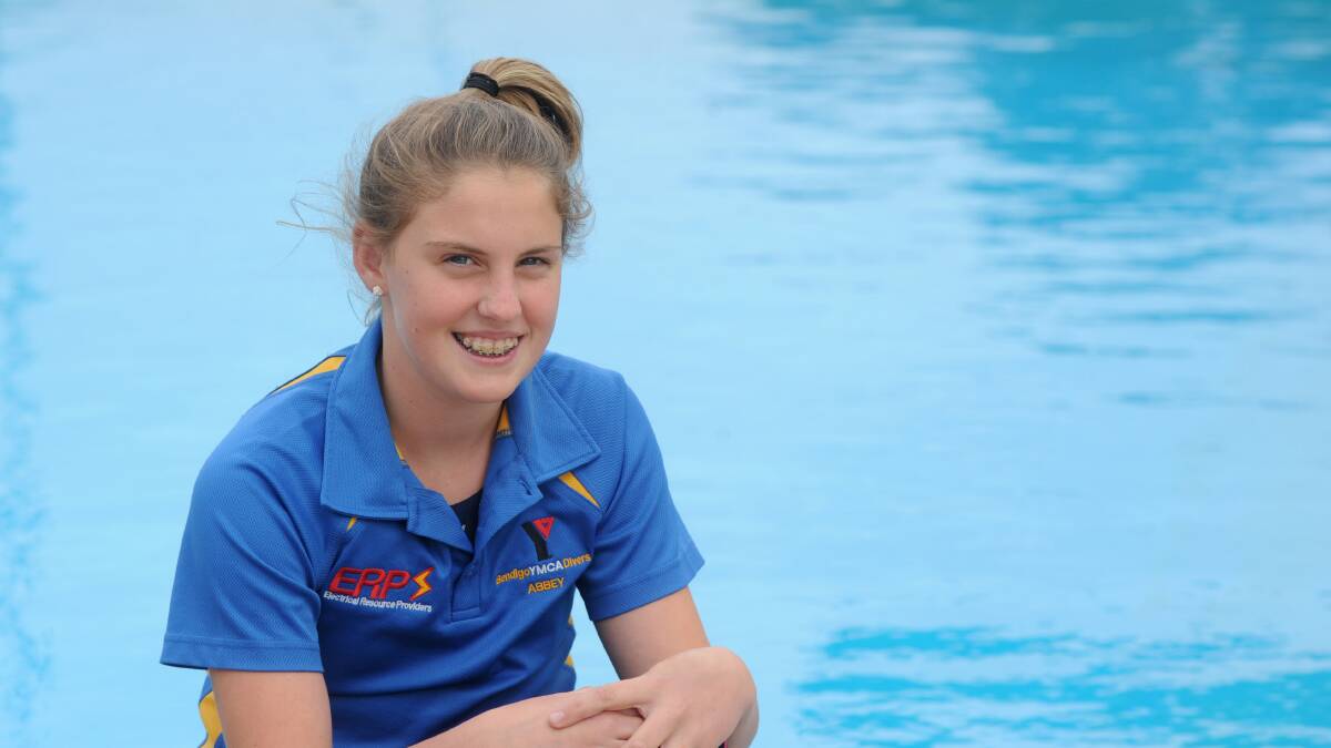 EXCITING TALENT: Abby Rowley relaxes by the diving pool at Bendigo Aquatic Centre. Picture: JODIE DONNELLAN