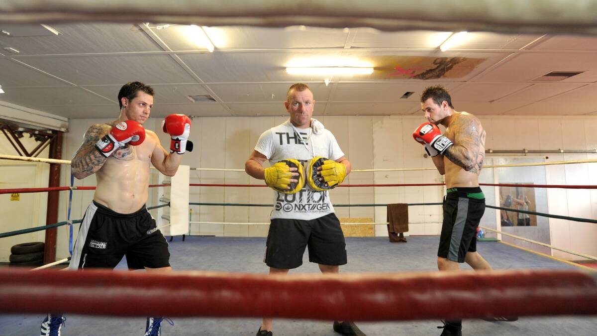 Andrew Piper, boxing trainer-promoter Frank Pianto and Shane Piper at Pianto's Boxing Academy in Kangaroo Flat. Picture: JODIE DONNELLAN