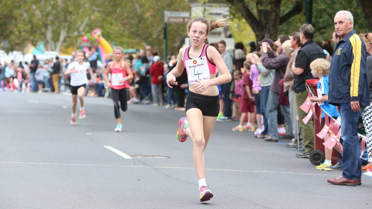 Yazmin Hayes from Our Lady of the Sacred Heart in Elmore wins the grade 5-6 girls race in the Bendigo Bank Dragon Mile. 