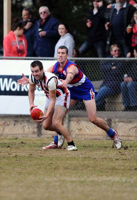 SAINTS TEST: Heathcote's Daniel Carroll and his team-mates face a big task in the Good Friday match at Leitchville. 