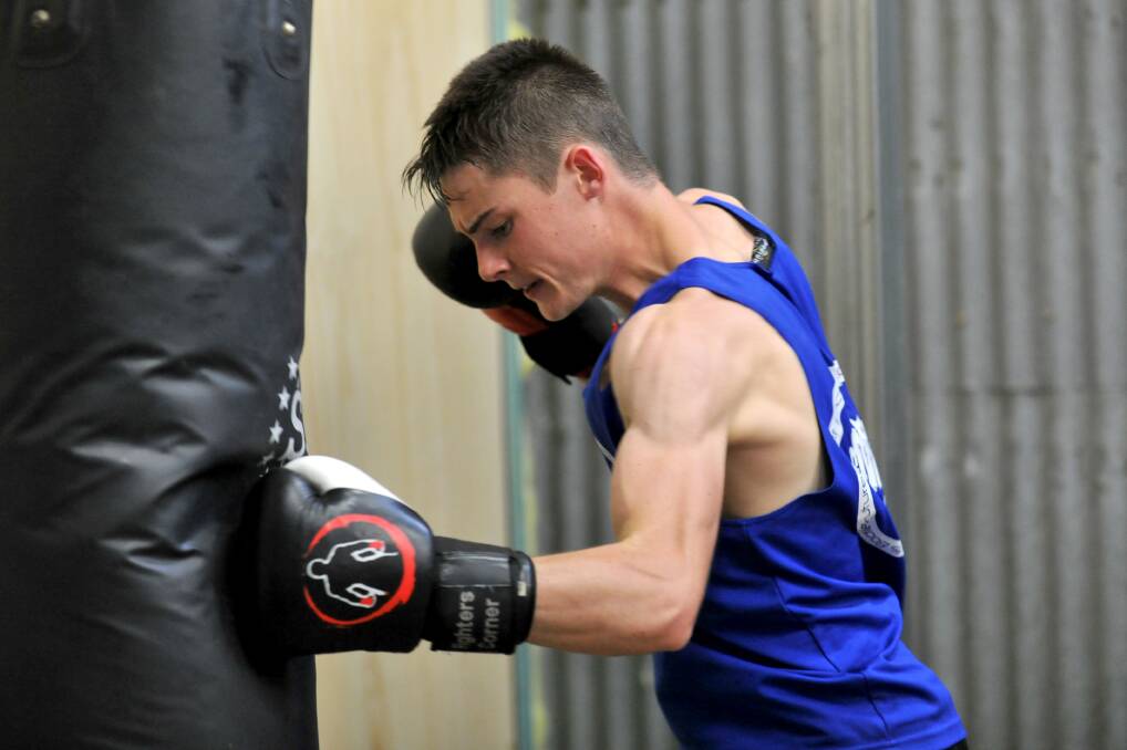POWERFUL STRIKE: Jordy Garland  smacks the heavy bag during another training session. 