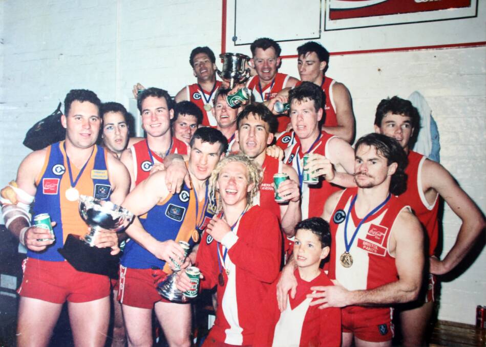 PREMIERS: Some of South Bendigo’s team after the 1994 grand final victory against Golden Square. 
