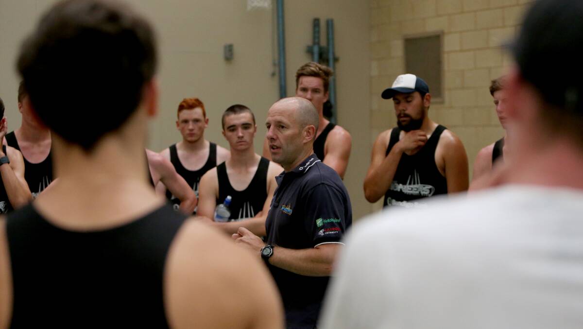 ENCOURAGING WORDS: Bendigo Pioneers coach David Newett speaks to the players after the latest round of fitness testing. Picture: LIZ FLEMING