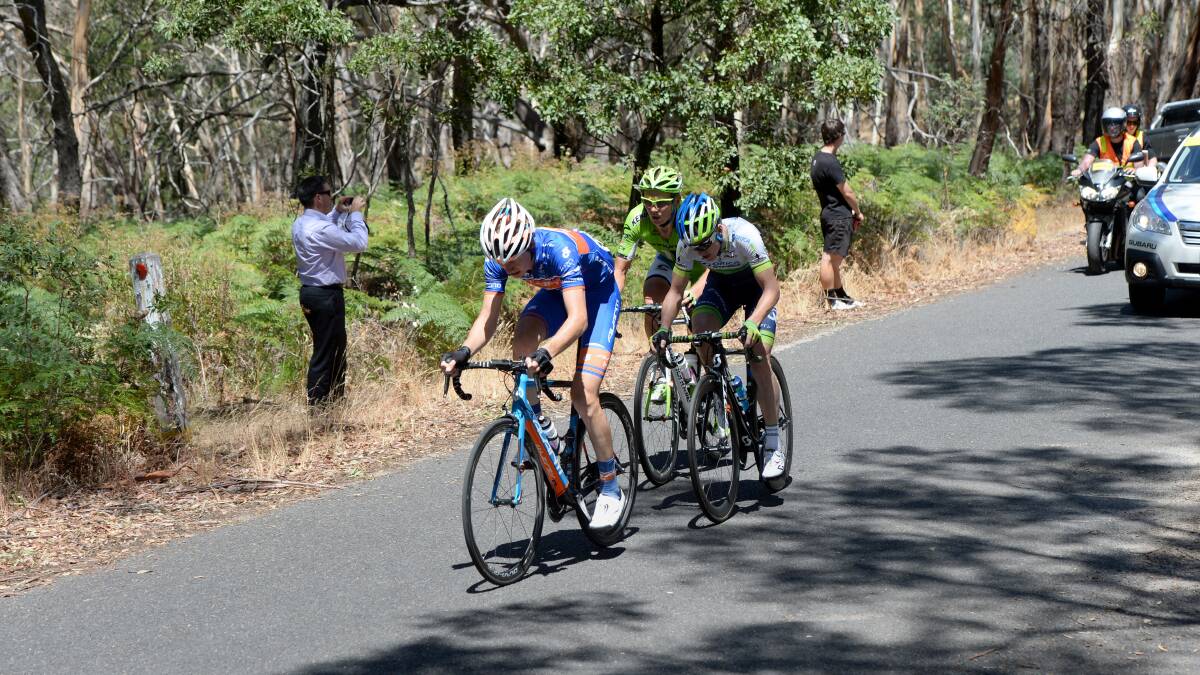 POWERING ON: Jack Haig leads Simon Clarke and Cameron Wurf on the climb at Mount Alexander in the Ballarat to Bendigo leg of the Jayco Herald-Sun Tour. Picture: JIM ALDERSEY