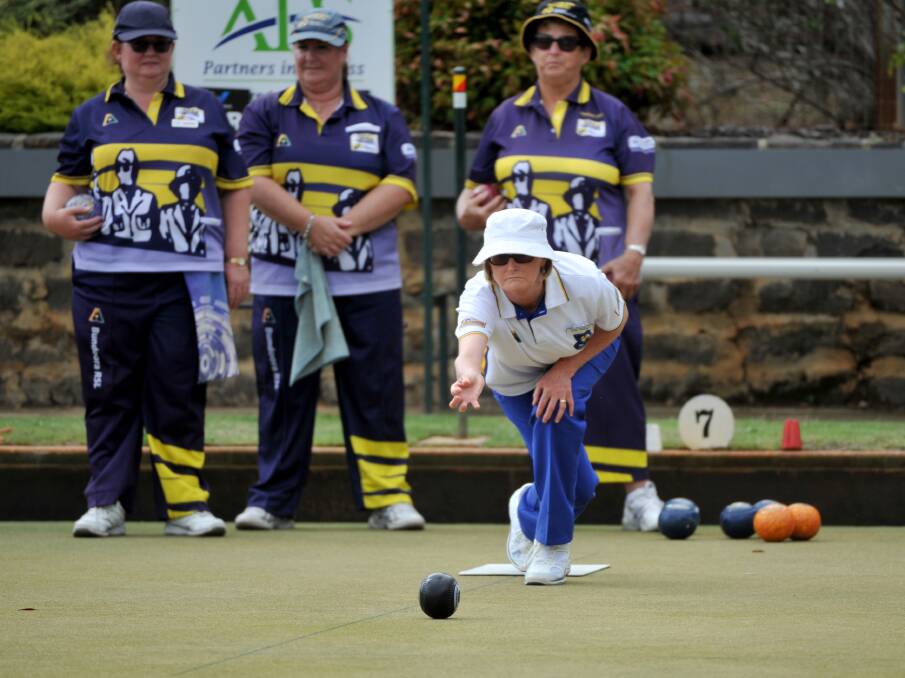 Portland's Marie Benbow bowls in the women's fours. 