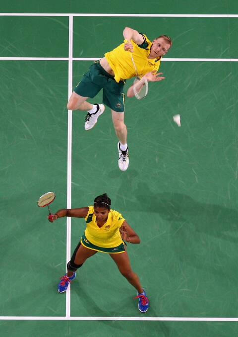 Swan Hill's Ross Smith teams with Renuga Veeran in the mixed teams action for badminton at the Glasgow Commonwealth Games. Picture: GETTY 