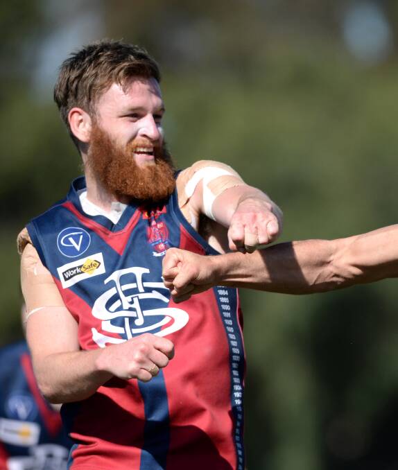 Sandhurst's Nick Stagg fought through the pain of a shoulder injury to represent the Dragons in the Bendigo Football Netball League grand final.  Picture: JIM ALDERSEY
