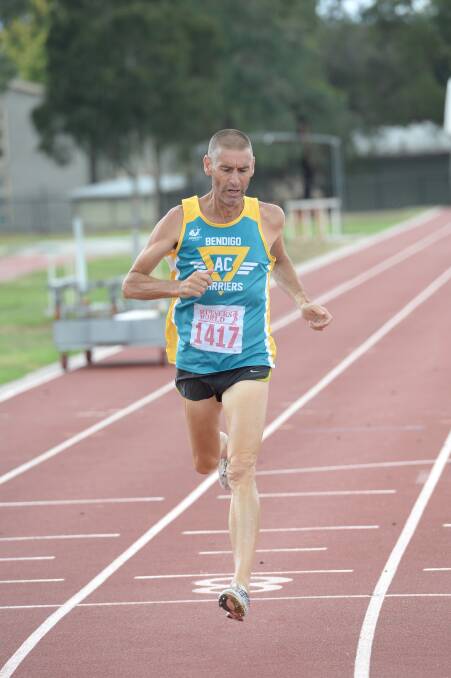 Peter Cowell from Bendigo Harriers fought on to be third in the first of the men's 300m heats. 