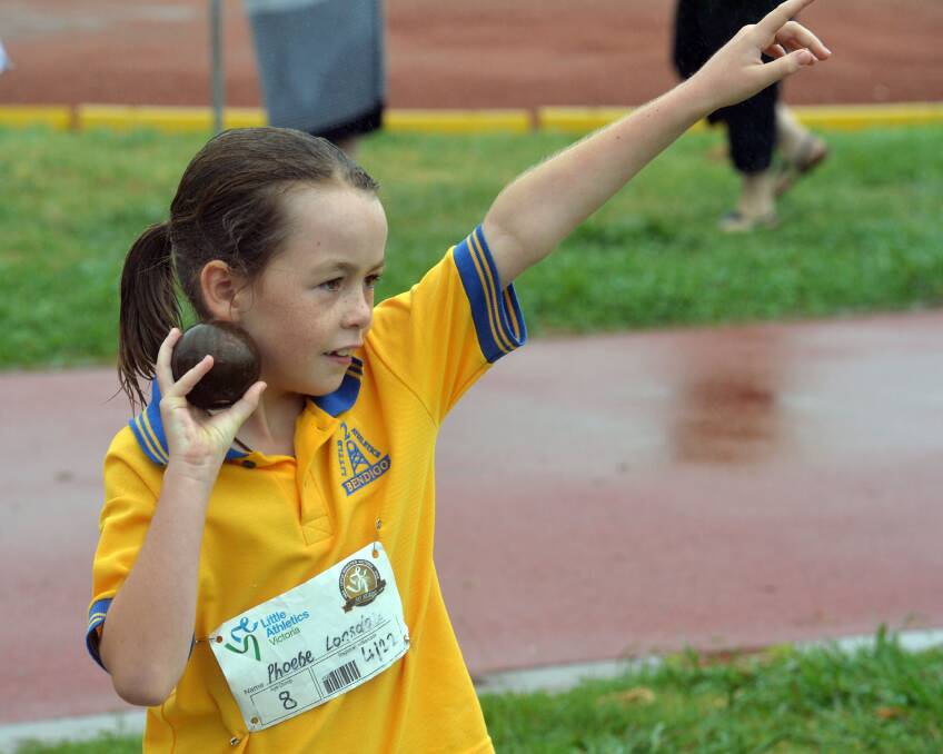 Phoebe Lonsdale in the under-8 shot put. 
