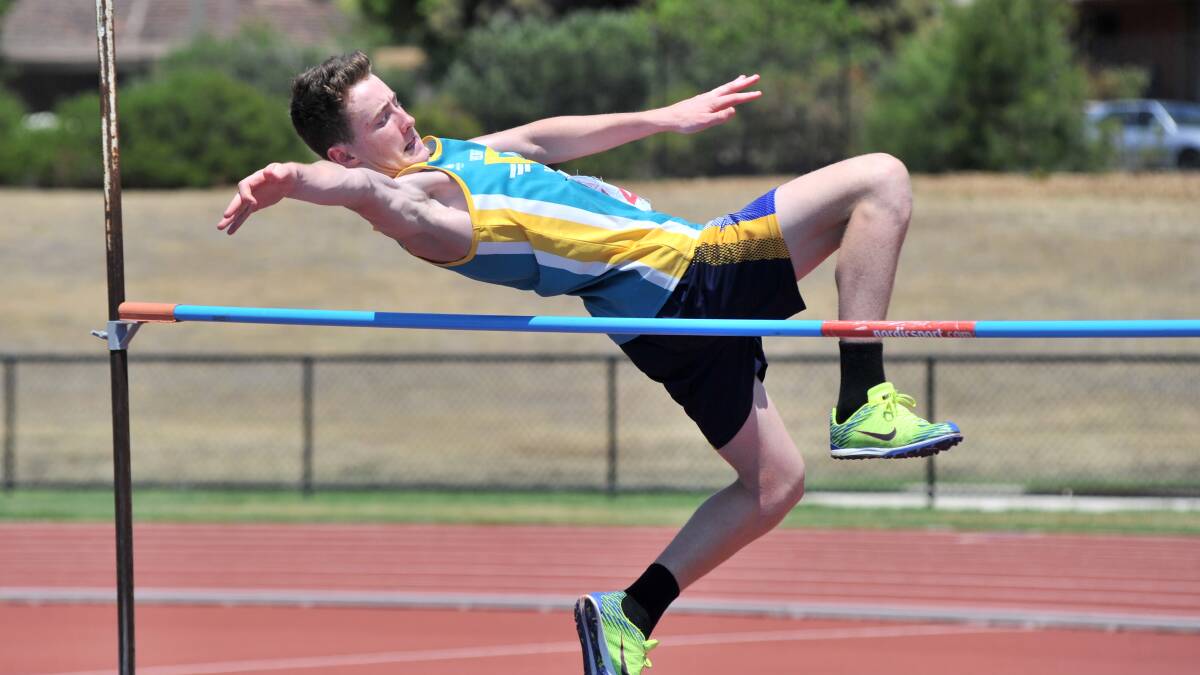 Declan Rochford competes in the high jump. Picture: JODIE DONNELLAN