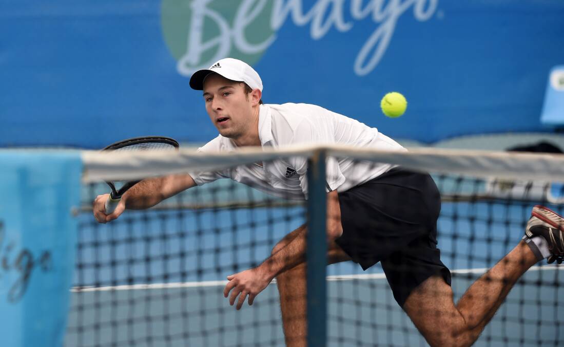 TOP SHOT: Samuel Thompson plays a cross-court forehand in his semi-final victory of the men's open singles at the Bendigo JWT and AMT classic. Picture: JODIE DONNELLAN