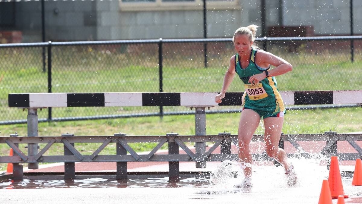 Lisa Ryan competes in the steeplechase. Picture: LIZ FLEMING