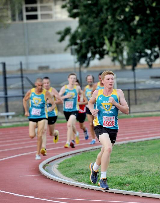 RUNNING ON: James Humphris competes in the 1500m. Picture: JODIE DONNELLAN