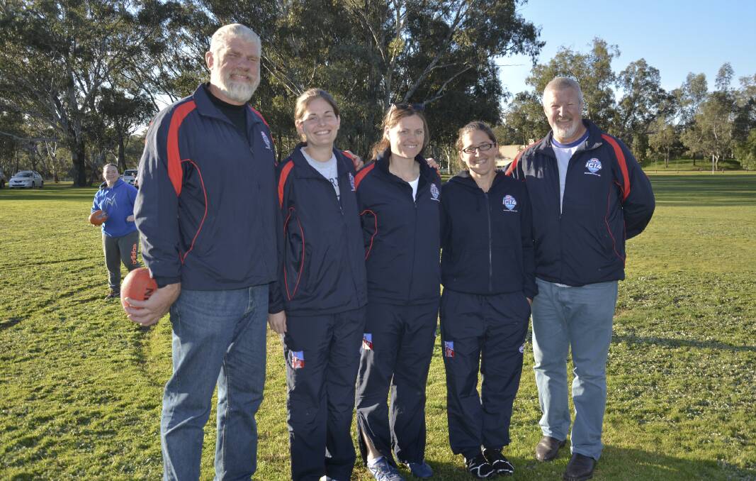 Players from the US Freedom women's Aussie rules football team attend Bendigo's under-12 girls' "Come and Try" training session in Kangaroo Flat
