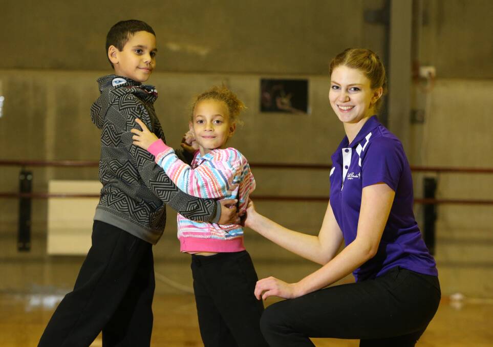 Gemma gives her young students some pointers during a ballroom lesson at Belle Etudes.