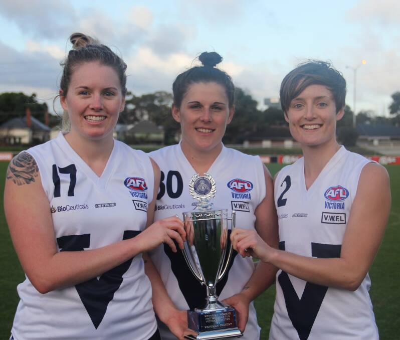 VICTORY: Bendigo footballers Sarah Baldwin, Amanda Carrod and Alana McNabb played for Vic Country's winning open team. Picture: AFL VICTORIA