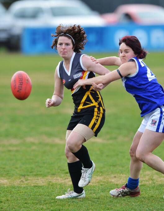 FOCUSED: Tish Stewart leads her opponent to the ball. Picture: BRENDAN McCARTHY
