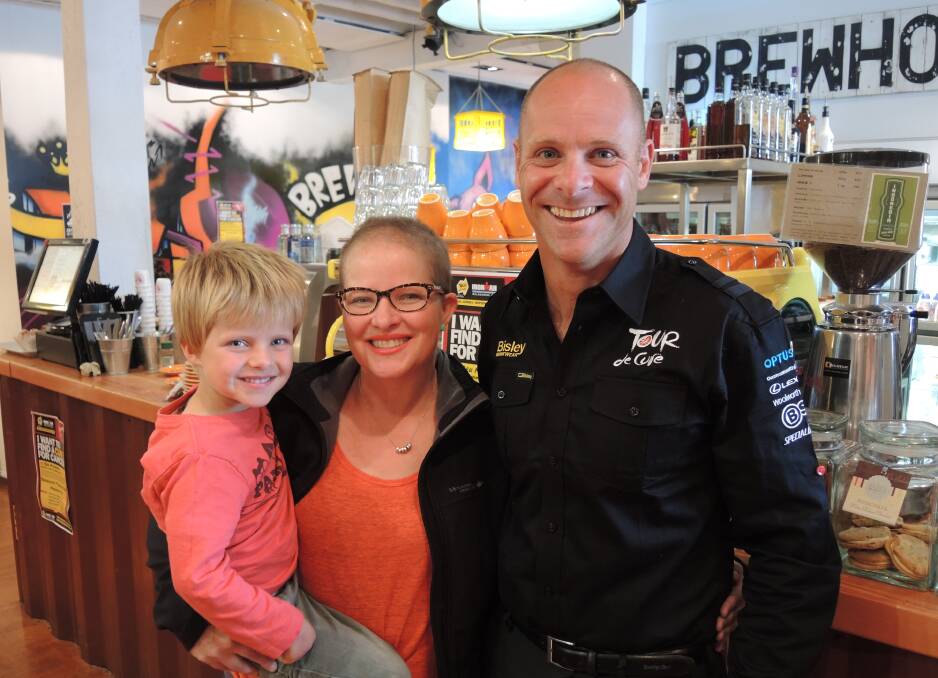 GOOD CAUSE: Ben McDermid with his wife Lisa and three-year-old son Jonty at Brewhouse Coffee Roasters.