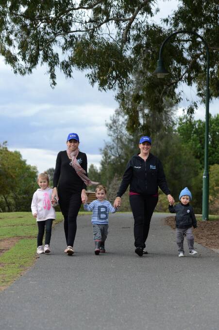 Kassidy, Ange and Axel Cail with Sharyn and Isaac Baré ahead of Pound the Pavement for Prems walk. Picture: JIM ALDERSEY

