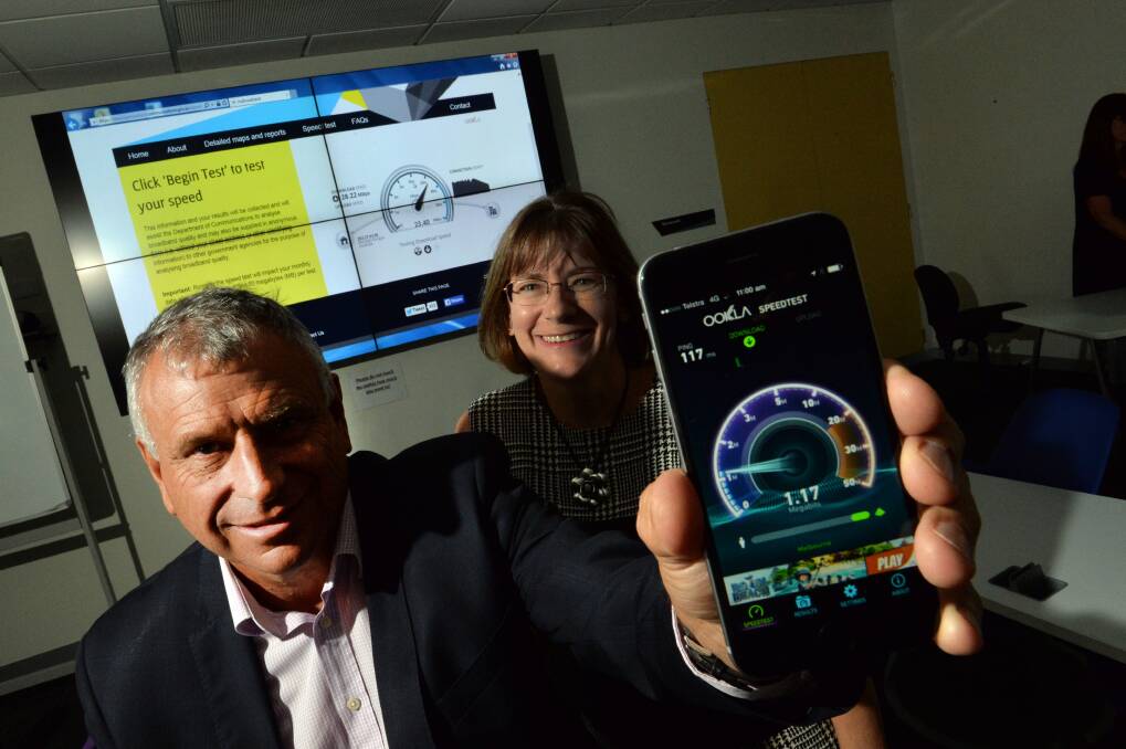 TESTING: Bruce Winzar and Jenny Dawson show off the test on the Ookla App. Picture: BRENDAN McCARTHY