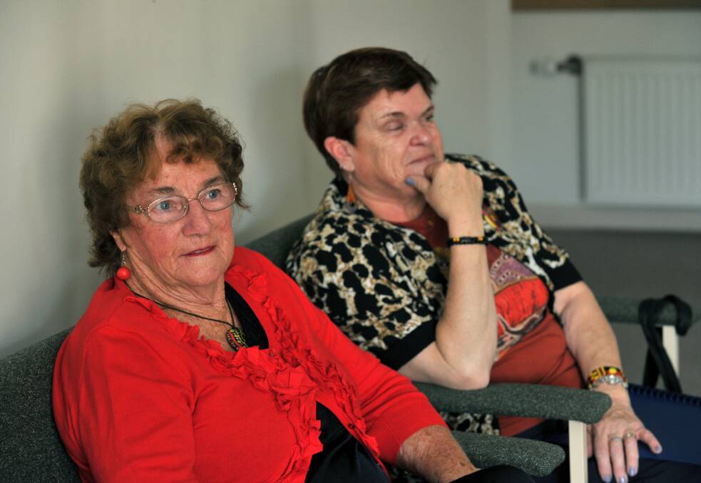 Aunty Georgie Jackson and Aunty Lyn Warren speak with clients of Strath-Haven Community Support Services Group. Picture: JODIE DONNELLAN 
